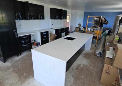 Gallery - Archant Cathedral Waterfall Island with hob cooktop and splashback combo